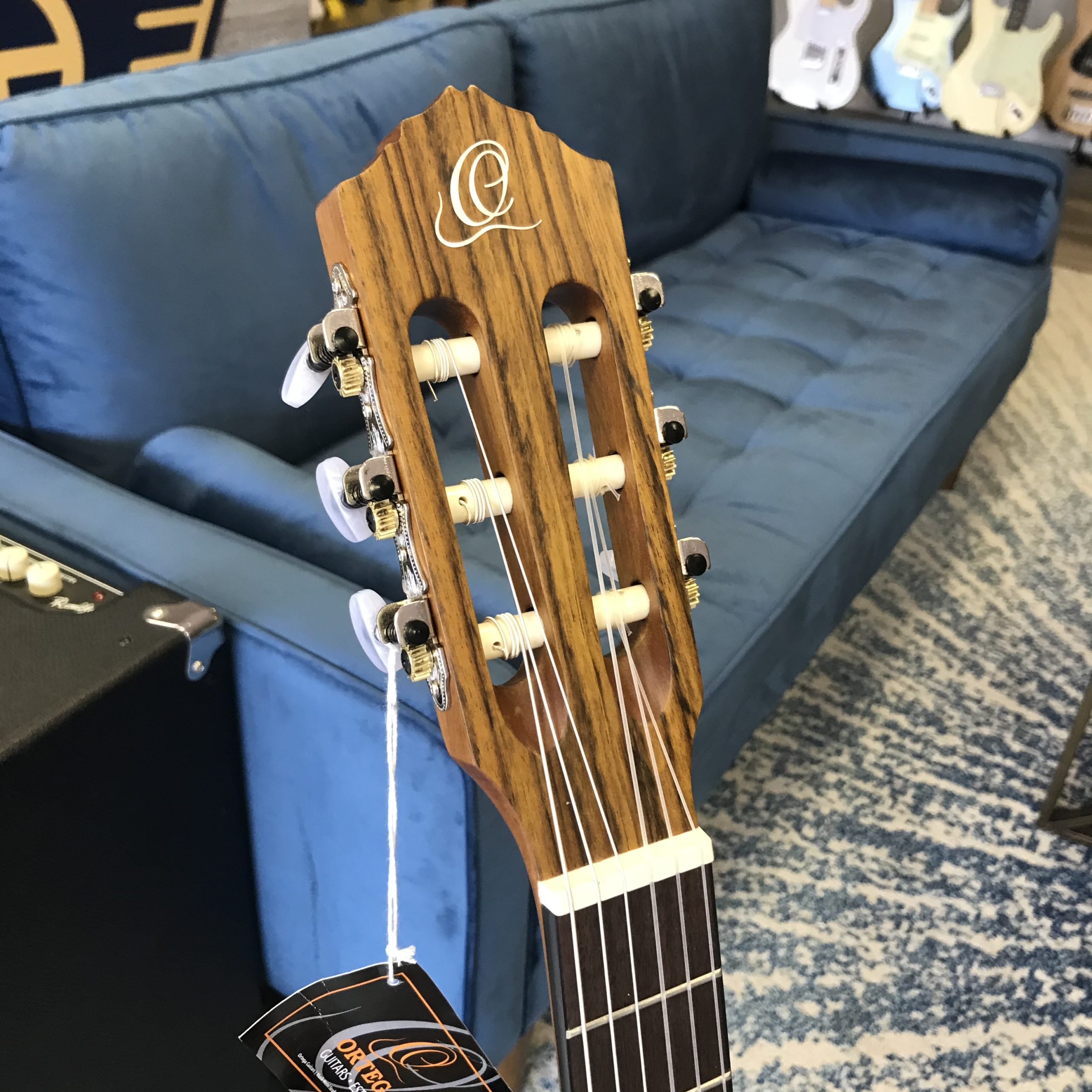 Picture of an Ortega R121-3/4 guitar, headstock